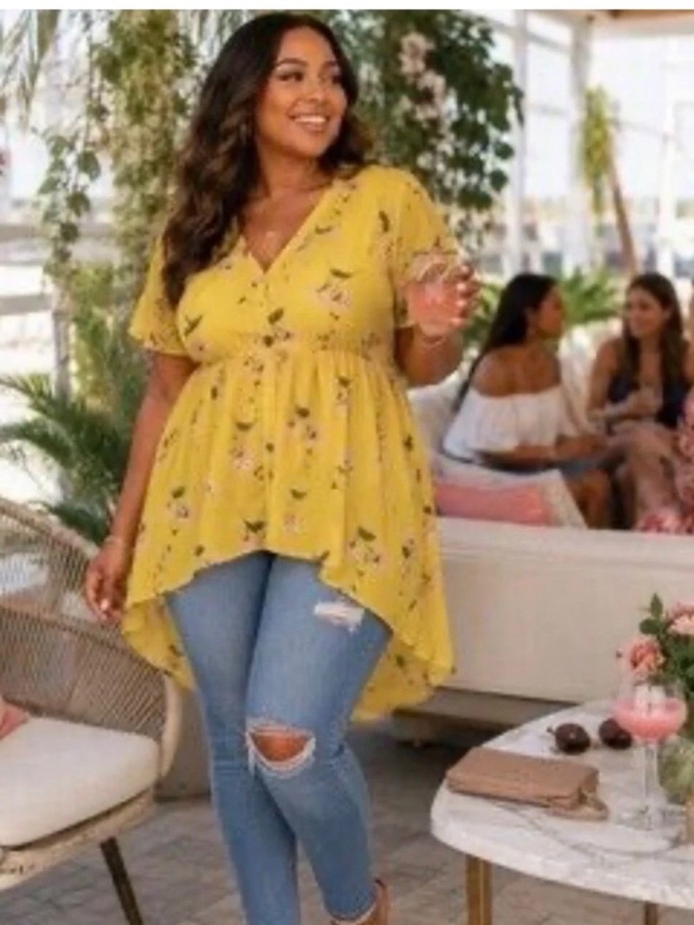 Torrid Lexie Babydoll tunic featuring a floral pattern and a high-low hem size 1